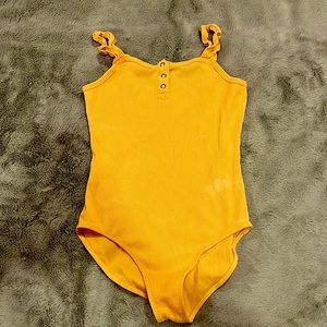 Ribbed yellow body suit